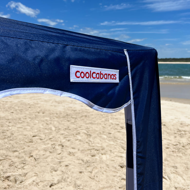 premium beach cabana coolcabana logo shot navy with white trim red label