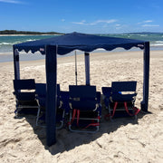 premium beach cabana coolcabana navy with white angled view of coolcabana on beach in navy#color_burleigh